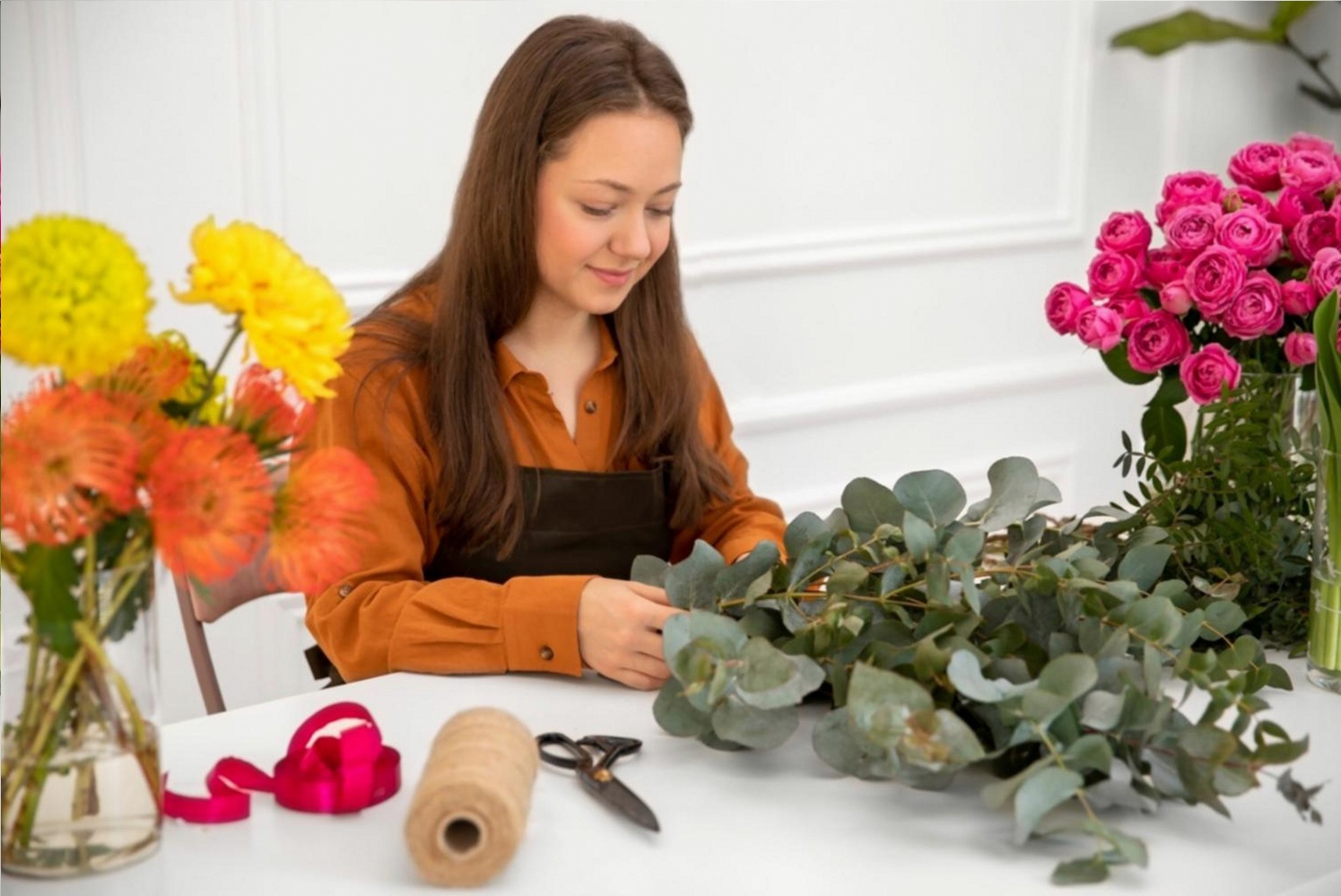 Florist arranging flowers at venue location